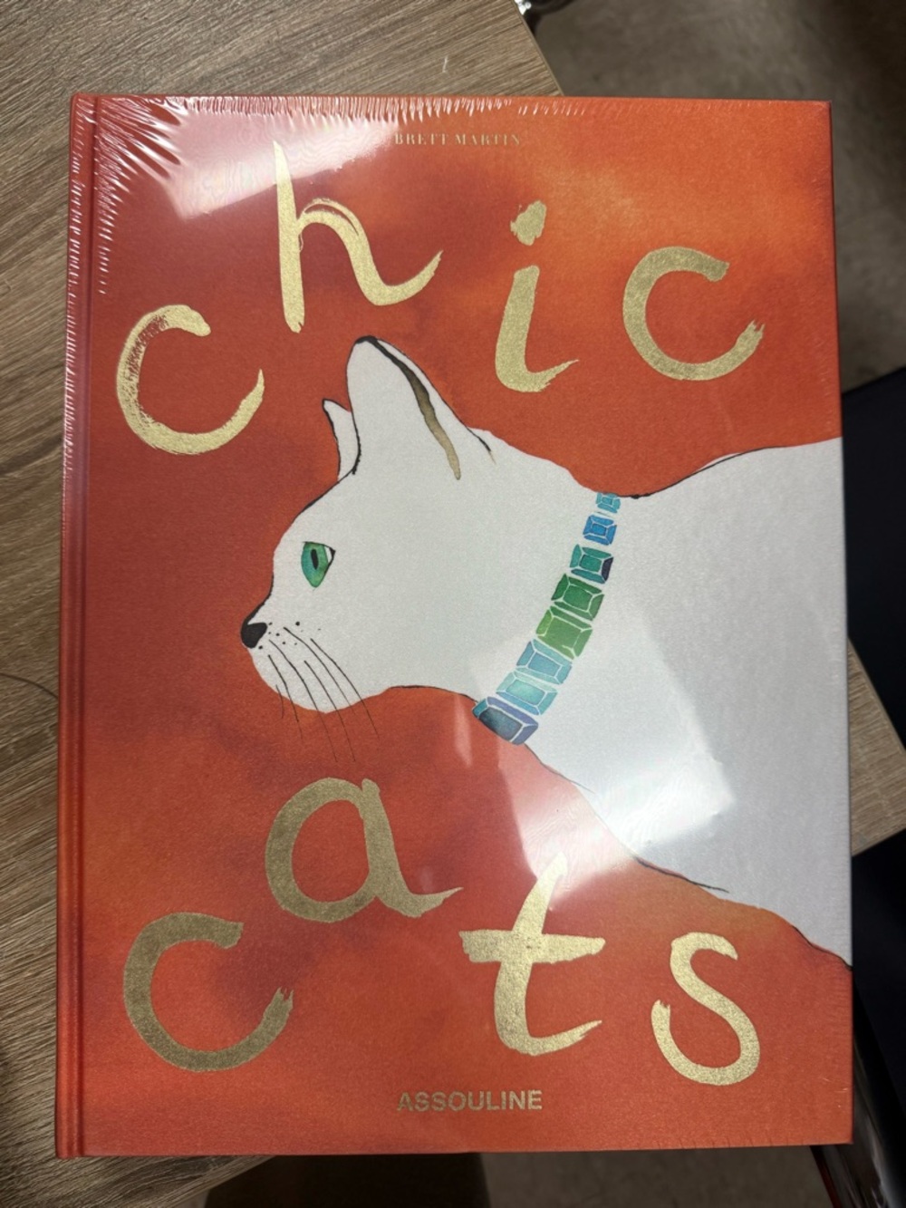 Assouline Chic Cats Book - Orange Cover with White Cat and Green-Blue Collar